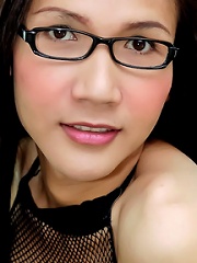 Ladyboy in glasses with huge...